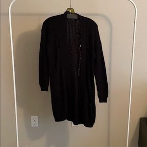 Black RDI cardigan with ripped detailing.